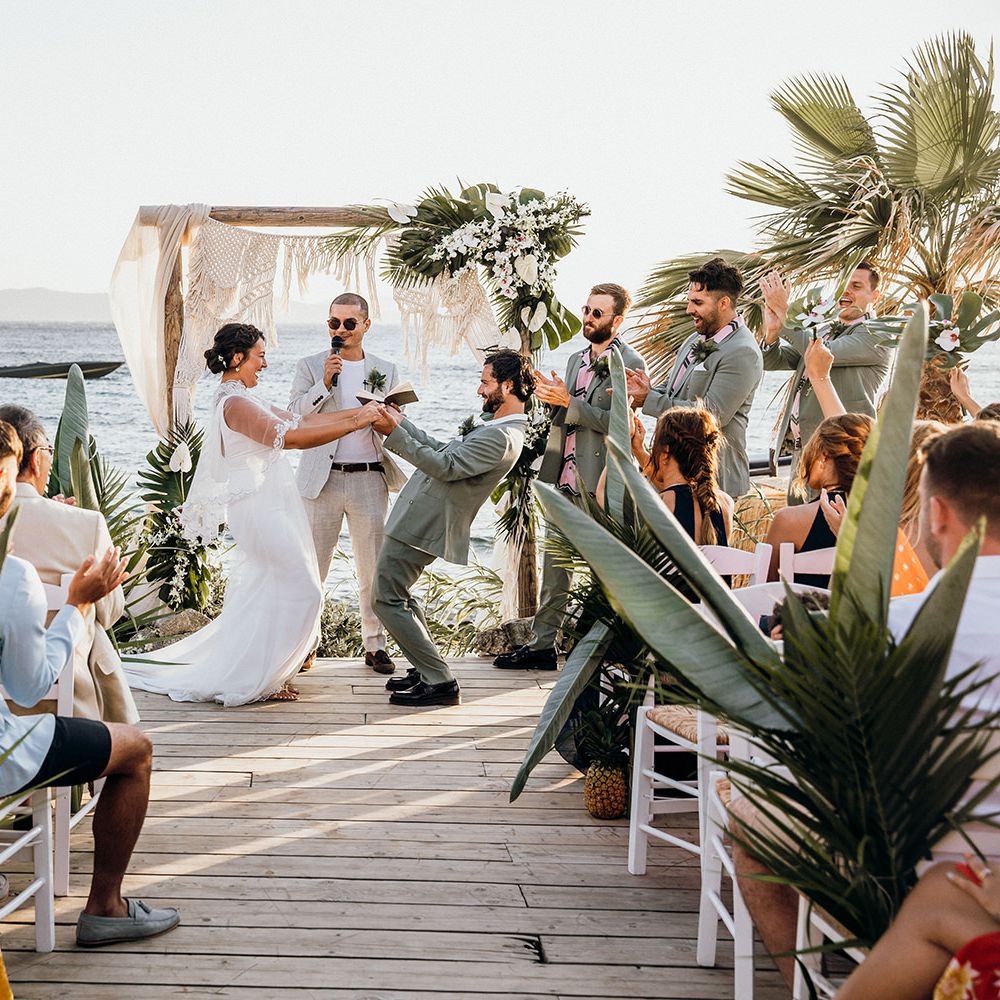 Bride and groom celebrate during ceremony