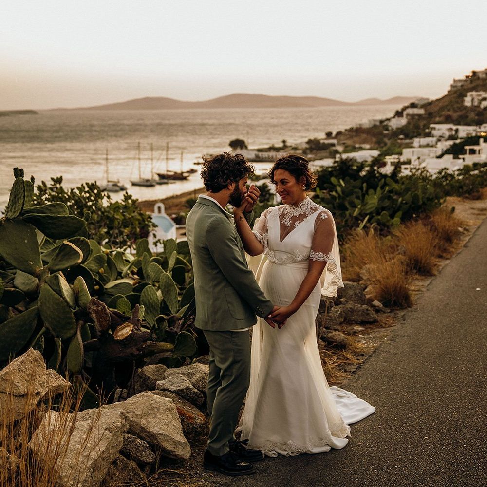 Bride and groom steal a moment together during the sunset in Mykonos