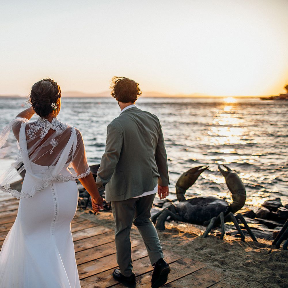 Bride and groom during Mykonos sunset