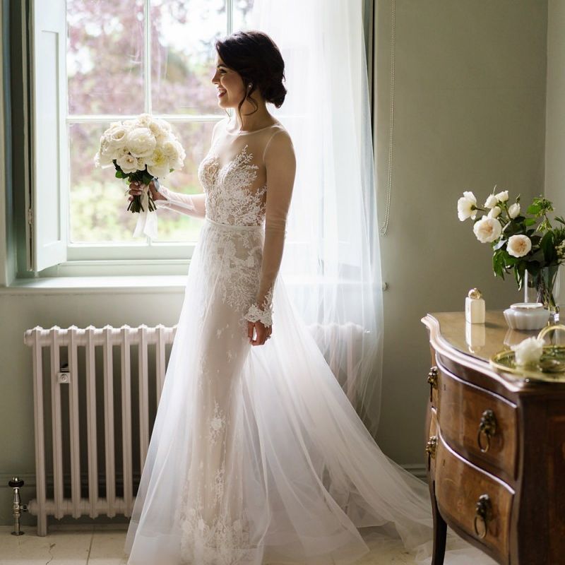 Beautiful Bride in Lace and Tulle Berta Wedding Dress