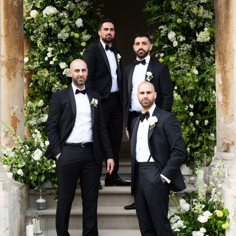 Groomsmen in Black Tuxedos and Bow Ties