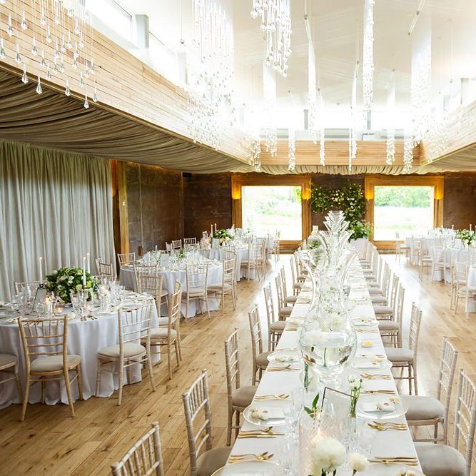Elegant Wedding Reception at Elmore Court with White and Green Flowers and Gold Details