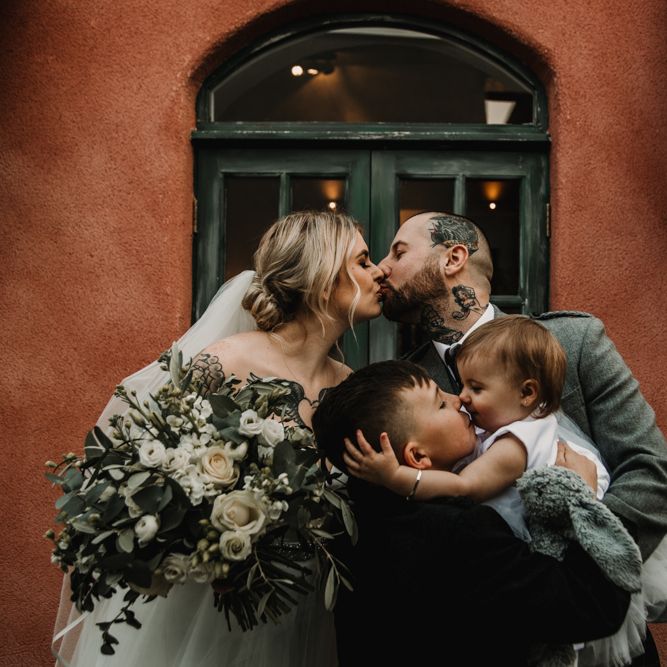 Family Portrait with Bride, Groom and Their Two Children