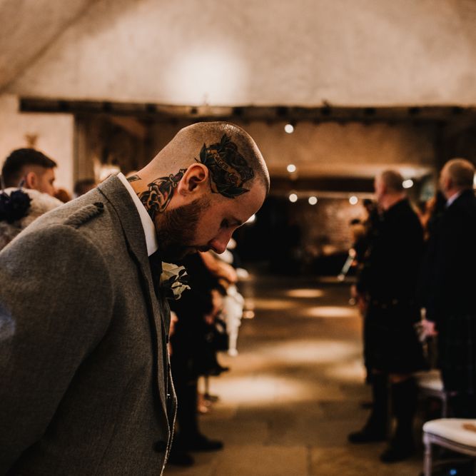 Groom in Highland Wear Standing at the Altar