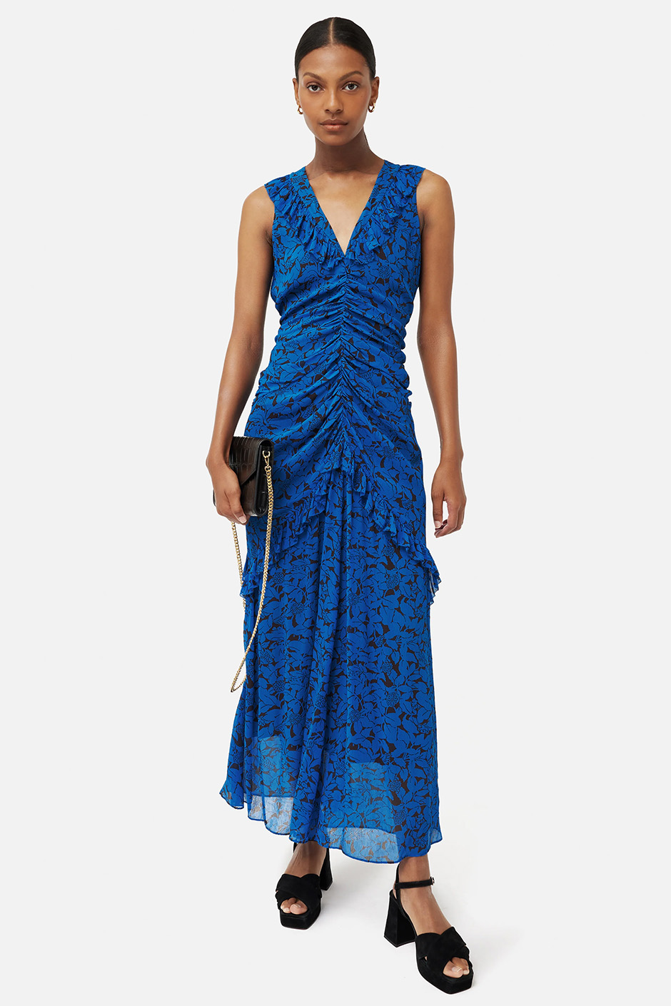 Blue crinkle draped dress with leaf pattern from Jigsaw as summer wedding guest dress idea