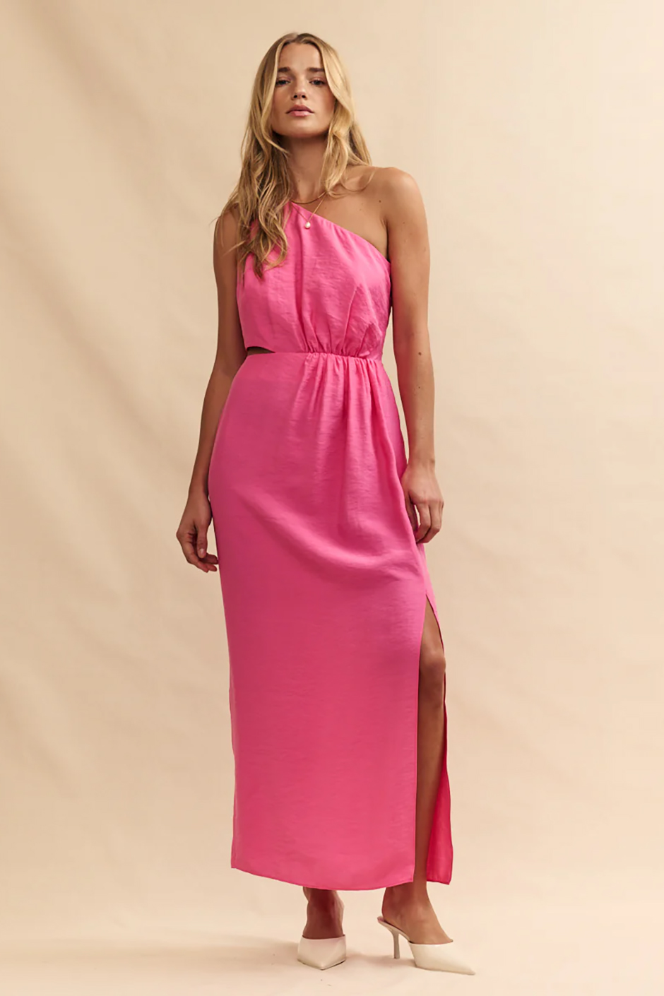 Lightweight one shoulder pink maxi dress with leg split and cut outs from Nobody's Child as summer wedding guest dress idea
