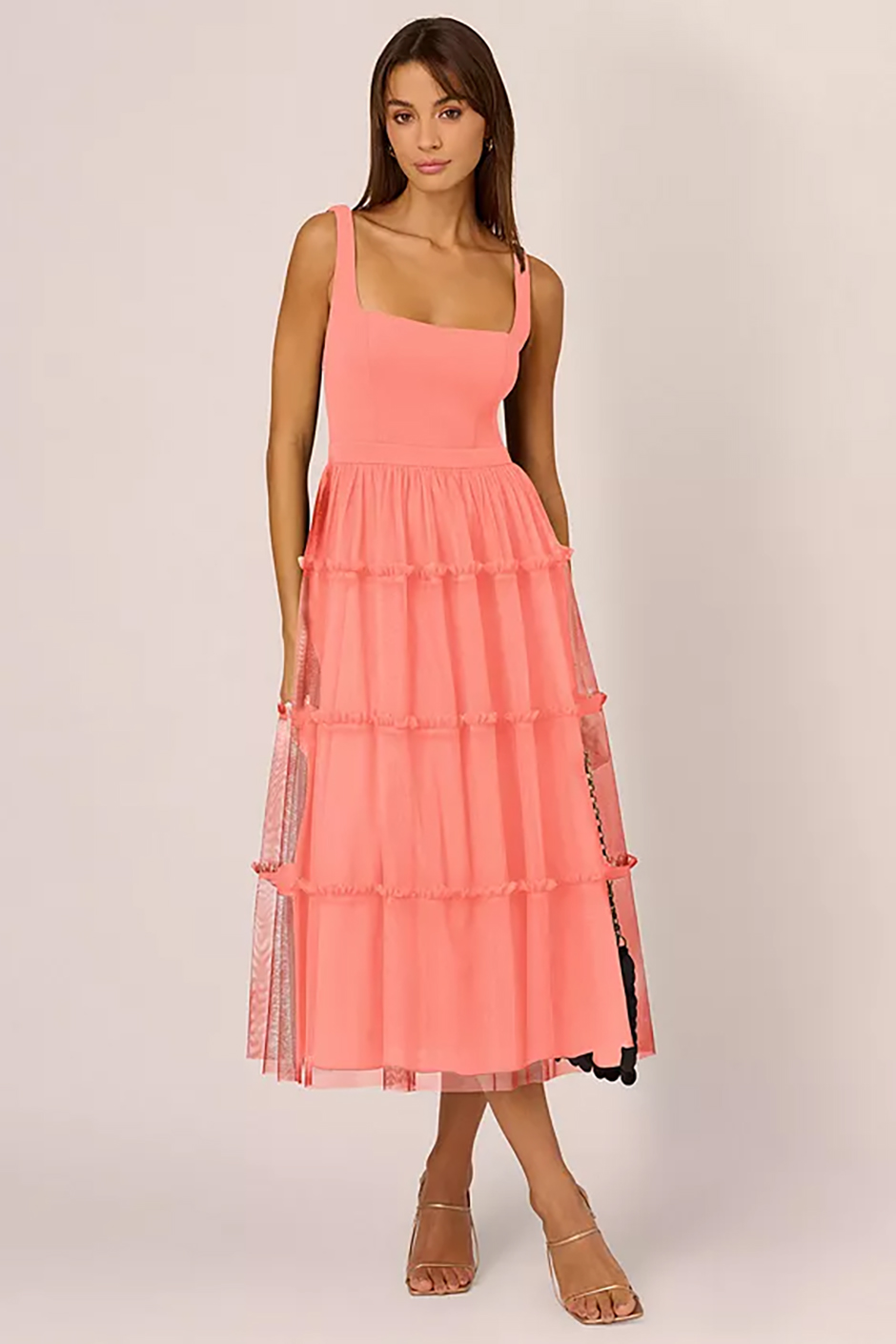 Coral peach bridesmaid dress from Adrianna by Adrianna with midi length and mesh design