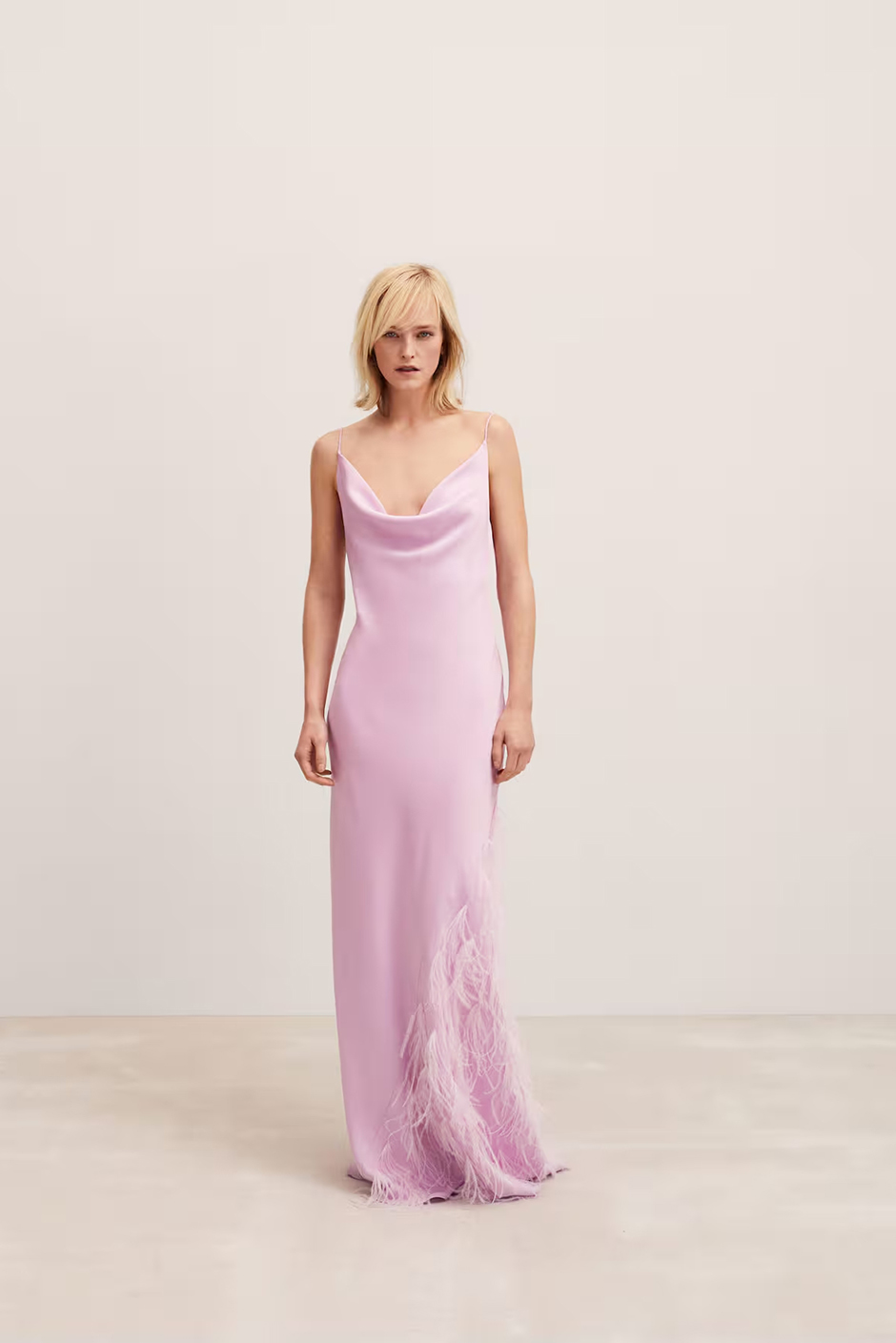 Pink wedding guest dress from Mango with feather detail 