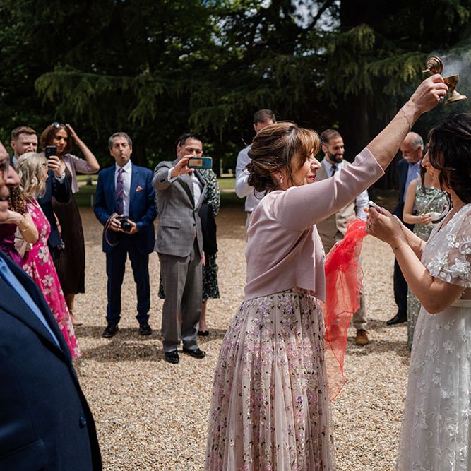 Greek Wedding Blessing at Northbrook Park with Meadow Flowers