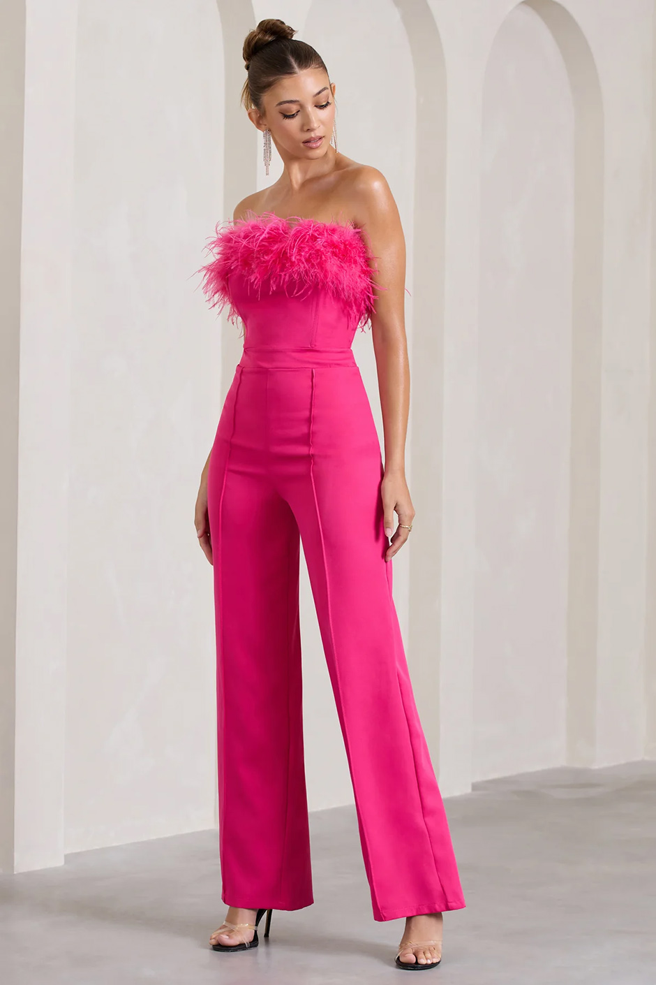Hot pink bandeau jumpsuit with feather trim detail from Club L London