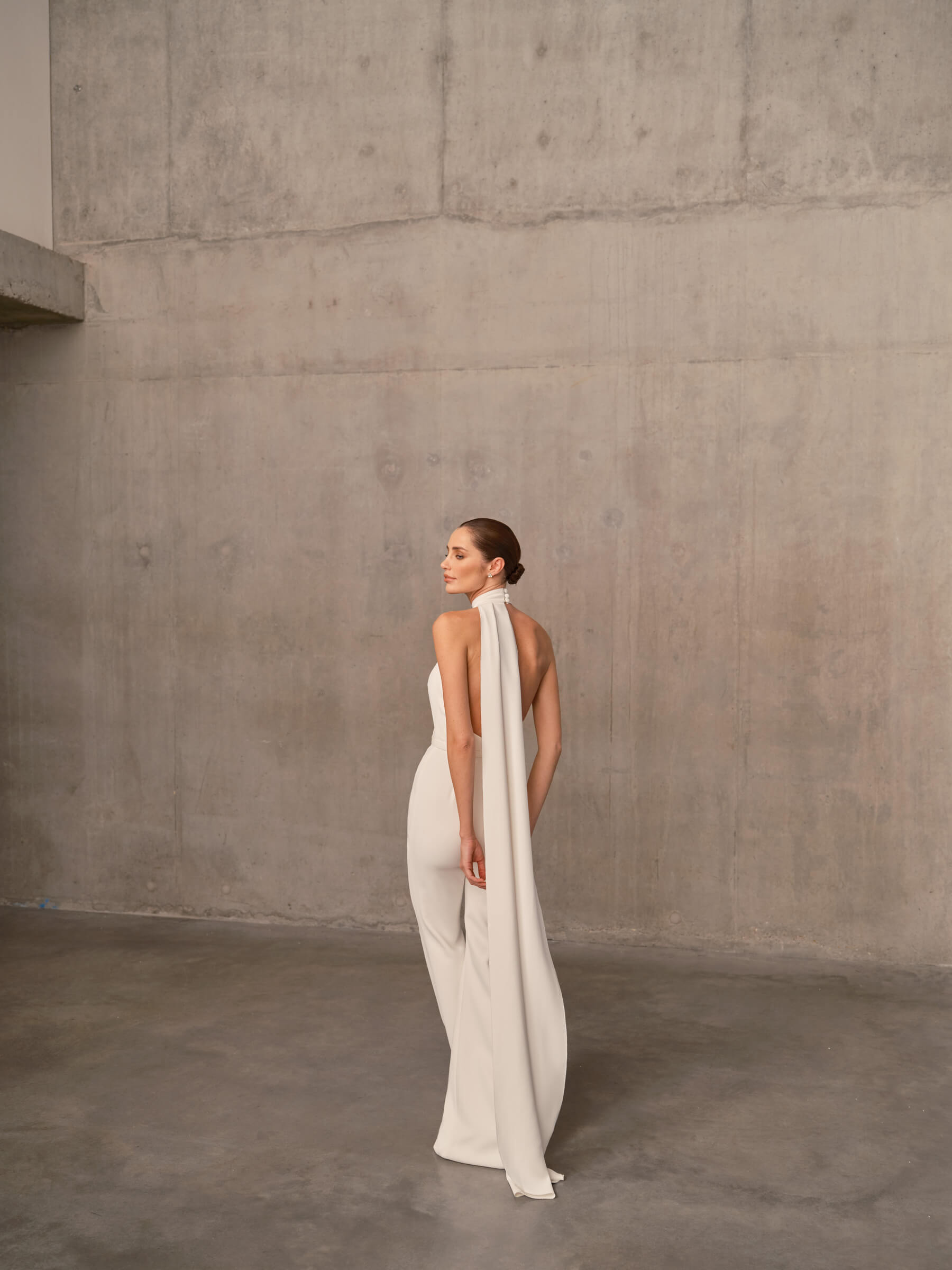 nadine-merabi-open-back-white-jumpsuit-for-brides.jpg