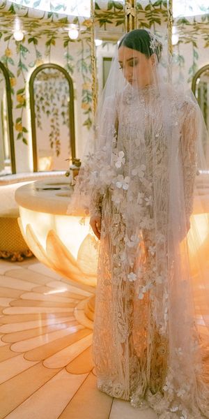 Sparkling Silver beaded lace Gown with a silver embellished Veil by Wilden London, photographed at Bacchanalia in Mayfair by Katie Julia.