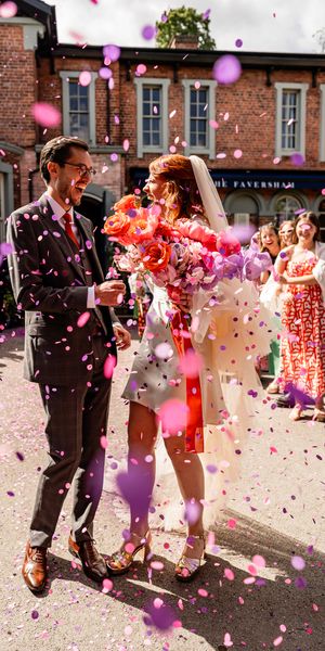 Colourful confetti at Alecs & Hannah's wedding at The Faversham by Stephanie Butt Photography