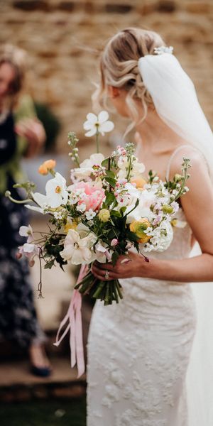 Spring bridal bouquet all dressed up with somewhere to go - photography by Nat and Lizzy weddings 