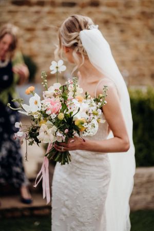 Spring bridal bouquet all dressed up with somewhere to go - photography by Nat and Lizzy weddings