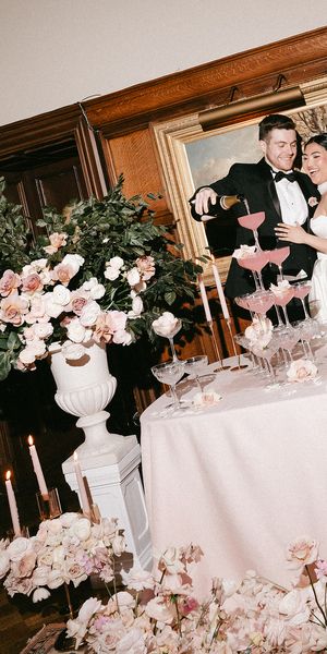 luxury wedding at dundas castle scotland pink florals champagne tower by Connor Barrett Photography