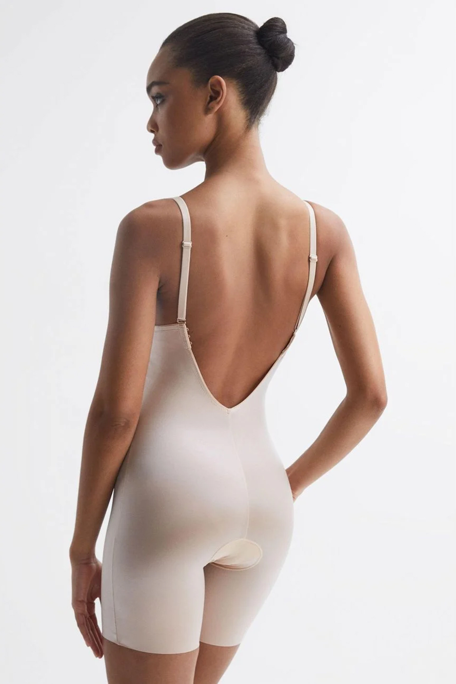 Low back bridal shapewear from Spanax, available at Reiss - Firming Plunge Low-Back Mid-Thigh Bodysuit