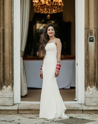 Classic Hinwick House country house wedding with the bride wearing a slip wedding dress