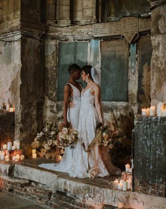 Asylum London Wedding inspiration with Two brides in different wedding dress and dried flower wedding table decor 