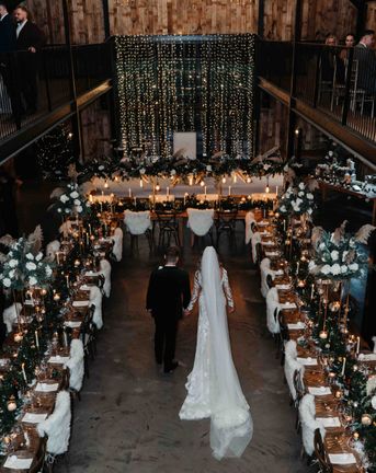 Fairy lights black tie winter wedding at the Hidden River Barn in the Lake District.
