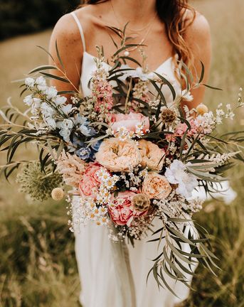 spring wedding flowers and bouquet with wildflowers