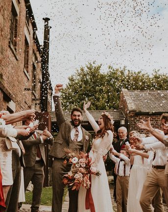 Thwaite Mills & Northern Monk Brewery wedding with confetti moment