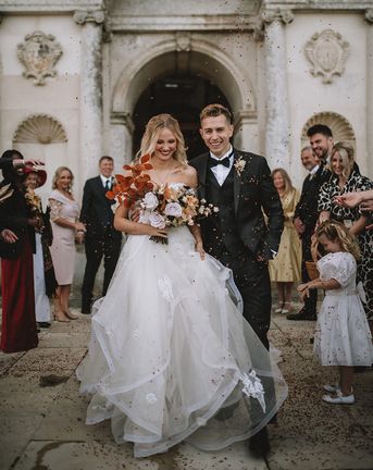 Vamps star James McVey wedding to model girlfriend Kirstie Brittain at Lulworth Castle with a bespoke wedding dress by Divine Day Photography