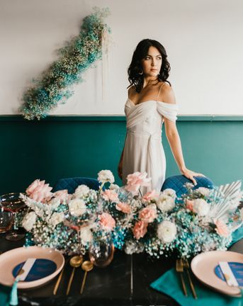 pink and teal wedding inspiration with gypsophila flowers, disco balls and stylish wedding dresses 