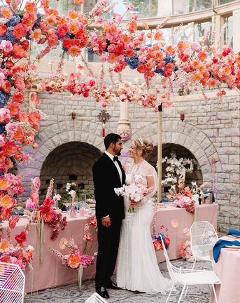 De Vere Tortworth Court wedding with pink flower decorations.