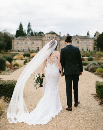 Luxurious Grantley Hall Wedding with elegant wedding cake, flowers and fashion