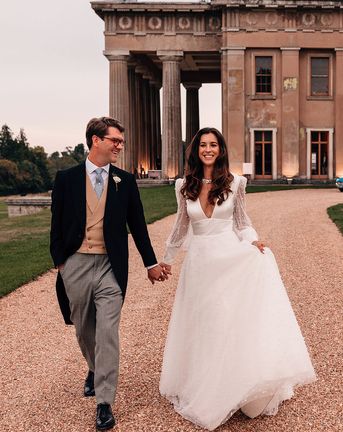 Mansion wedding at The Grange in Hampshire with the bride in a Sassi Holford pearl wedding dress.