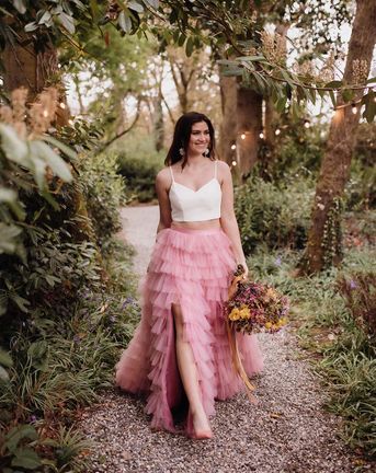 Spring wedding inspiration with colourful flowers and a pink ruffled wedding skirt and short wedding dress by Kyrstin Healy Photography