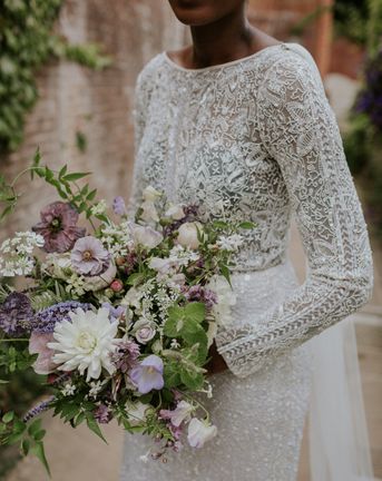 A Roundup of Stylish Long Sleeve Wedding Dresses including lace, applique, fitted, flare and sheer.