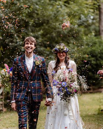 sustainable wedding with Vivienne Westwood tartan suit and secondhand wedding dress