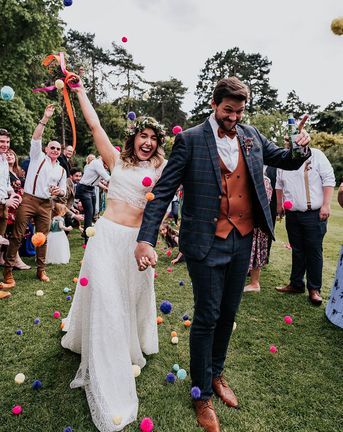 Wedding fest in Loughborough with a pom pom confetti exit!