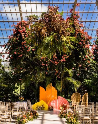 Sefton Park Palm House wedding venue decorated for colourful wedding day.