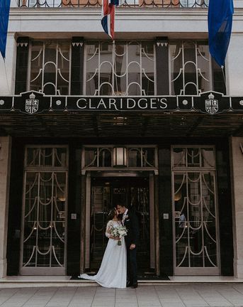 Claridge's wedding in London with black tie dress code and bride in maternity wedding dress.