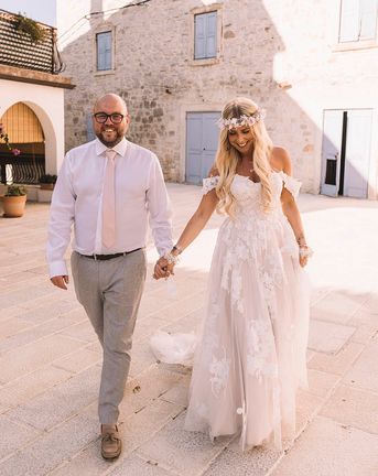 Bride and groom at their Croatia wedding with a boho theme.