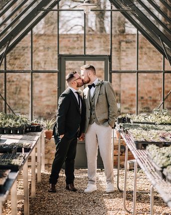 Elmore Court in Gloucester gay wedding with monochrome styling