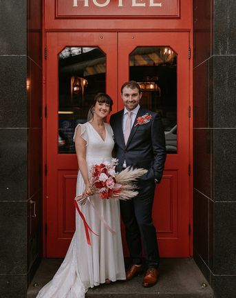 The Bedford in London wedding with bride in a sparkly wedding dress and groom in navy suit.