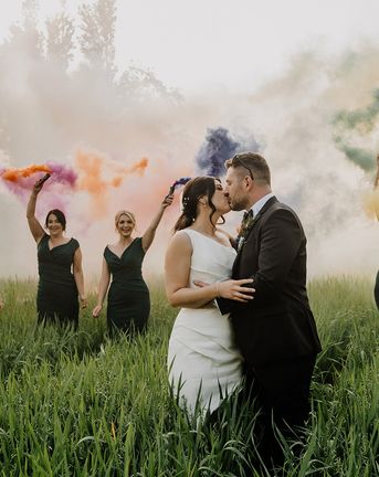 Bride and groom have smoke bomb photoshoot at Larkspur Lodge wedding.