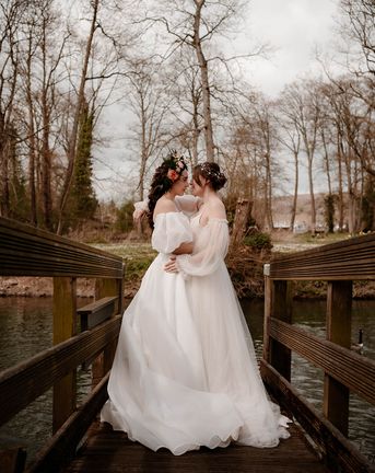 Ethereal wedding dress and inspiration at Mapledurham House and Estate with two brides and romantic flowers by Katherine And Her Camera