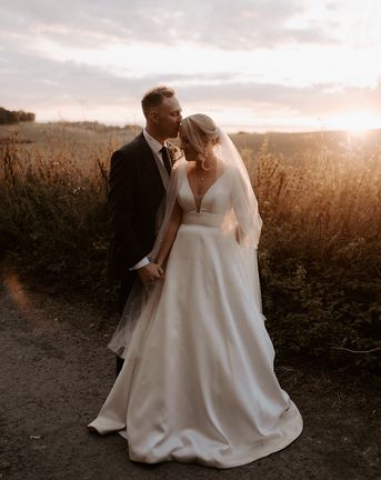 A rustic wedding at Bake Barn during golden hour.