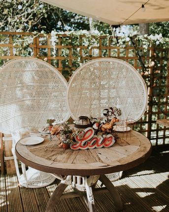 Peacock Chairs, Sweetheart Table and Leather Jackets for Autumn Wedding at The Copse, with Bride in Novia D'Art Dress, shot by Rosie Kelly Photography