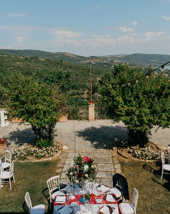 Wedding in Umbria, Italy with Red Flowers and DIY Copper Decor