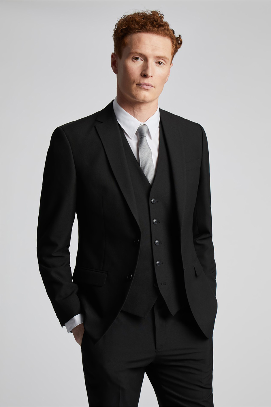 Tailored style fit black groomsmen suit from Limehaus available at Suit Direct 