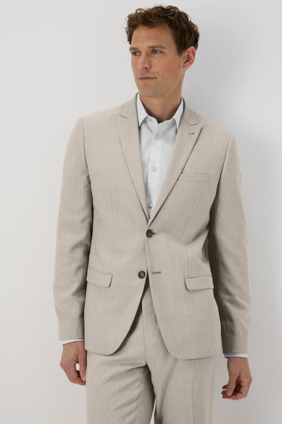 Beige groomsmen suit from Matalan in stone natural tone, slim fit design for weddings