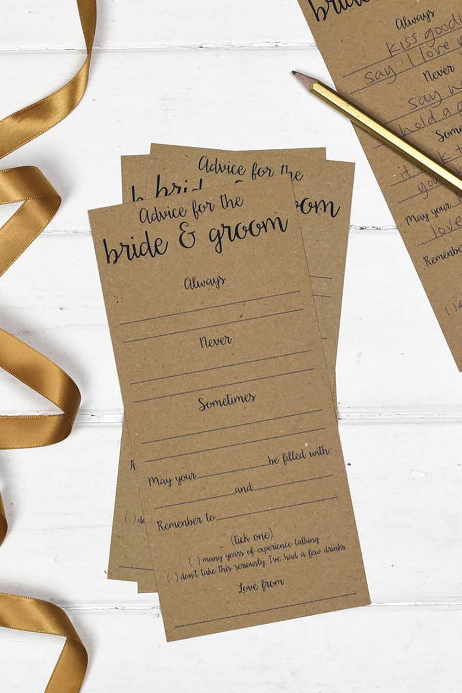 Paper advice cards for the bride and groom for guests to write at wedding
