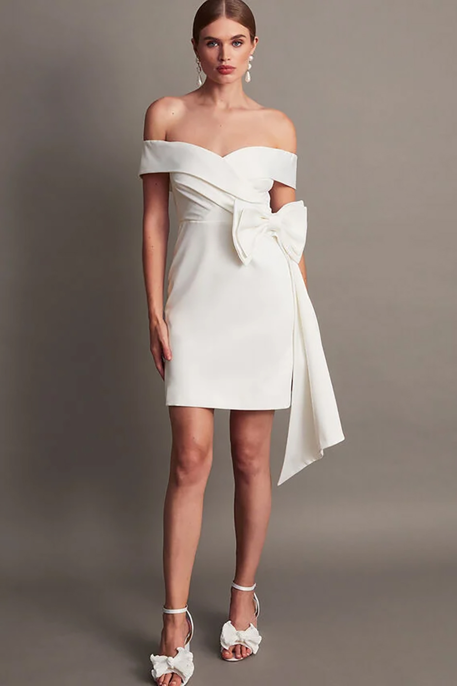 Mini off the shoulder bridal dress from Monsoon with statement bow