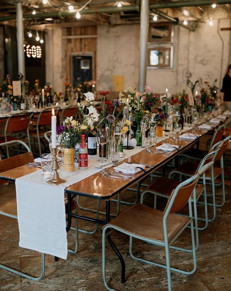 Wildflower wedding theme at Holmes Mill wedding with botanical tablescape.